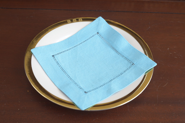 Solid colored hemstitch cocktail napkin 6". Blue Atoll Color